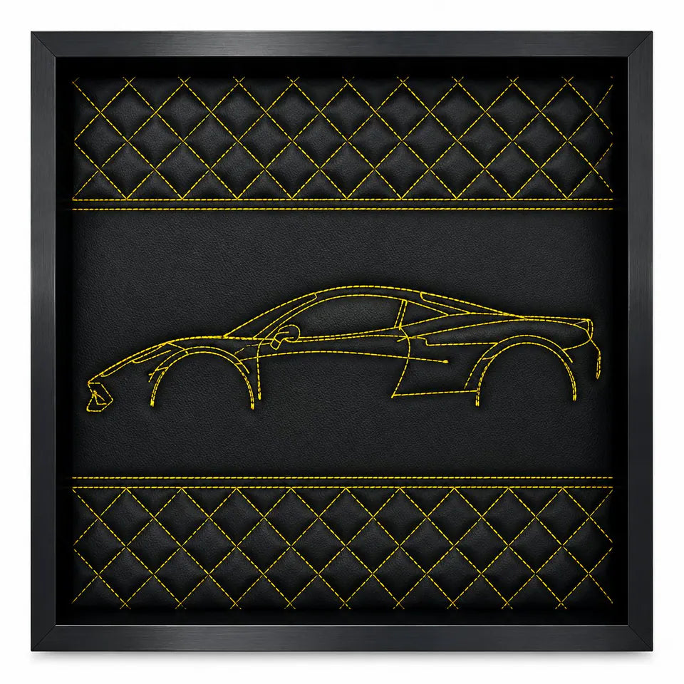 Framed black leather wall art with yellow stitching